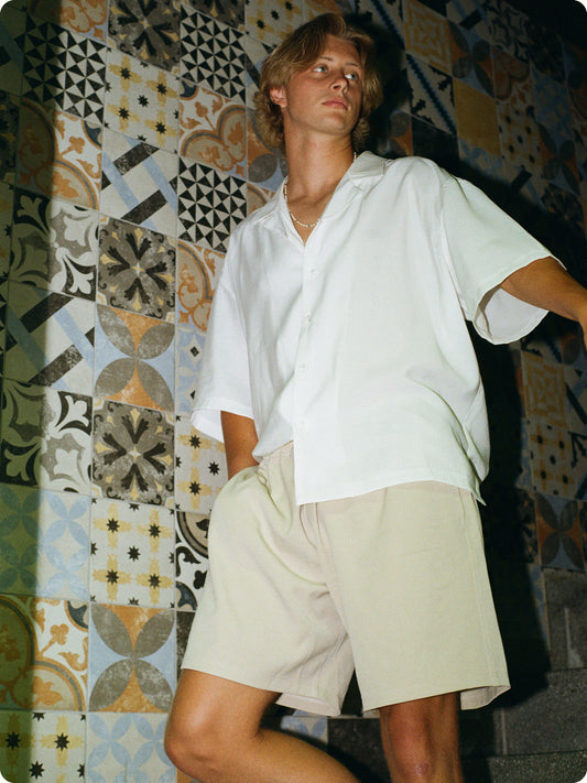 Tennis Player Tim Fischer wearing our Sillage Evening Shorts