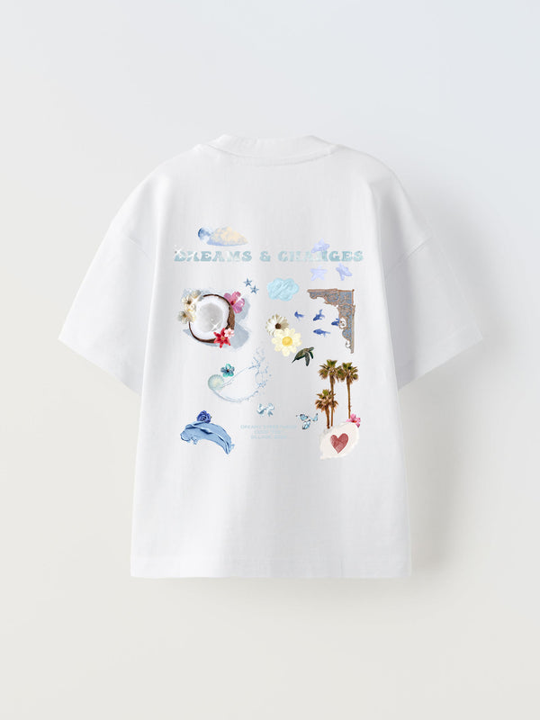 Oversized White T-Shirt with a summer collage of coconuts, flowers, palms, butterflies and art. A Dreams & Changes Text with clouds at the top.