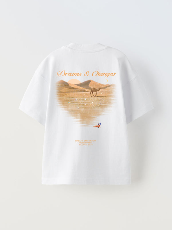A oversized white t-shirt with a dreamy desert design. Golden sand with shiny colorful gems during sunset.