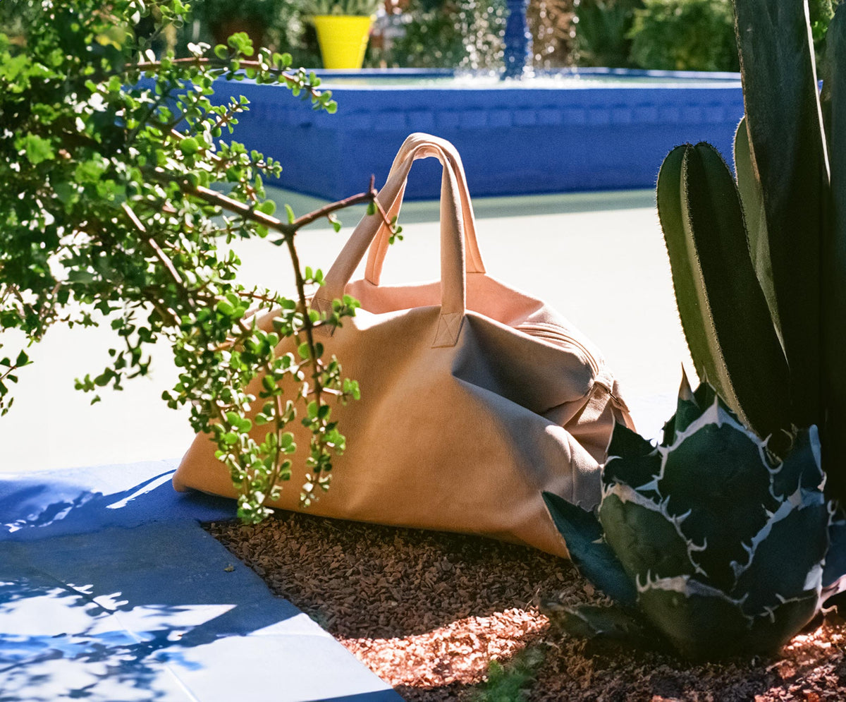The Sillage 'Away' Weekender Desert Dream Colorway visiting YSL's Jardin Majorelle, on vacation in Marrakesh